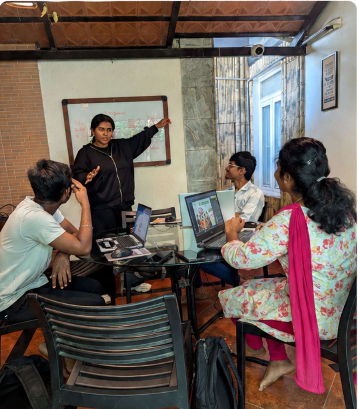 Growvia trainer leading a hands-on design session with students